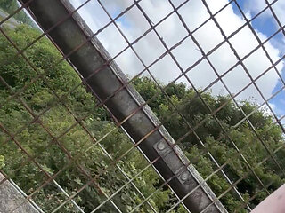 Naked above highway. Caught by cars