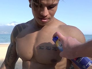 Sensual muscle admiration session by the sea
