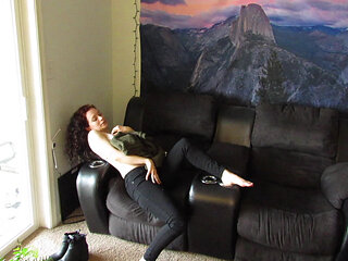 slow strip tease out of a sweater and jeans