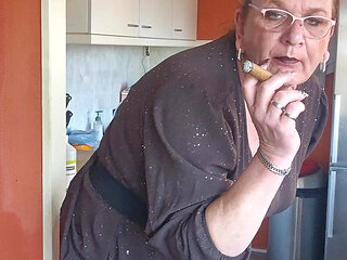 Enjoying a cigar while enjoying my dildo