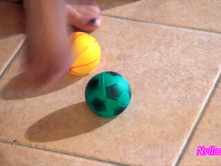 Nyllady Squeezes Rubber Balls Massaging Her Hosed Feet
