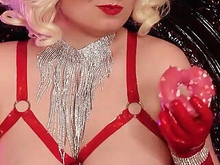 Sexy Pin up Girl Eating Donuts in Latex Gloves