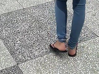 Public Wetting Jeans in Park Near the Beach