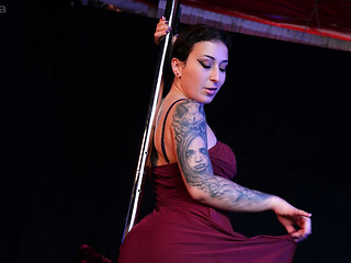 The pole dancer shows off
