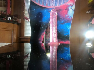 Trans slut Daphne fucks herself on the table with her pink dildo