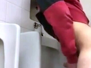 Twink's Handjob in the WC