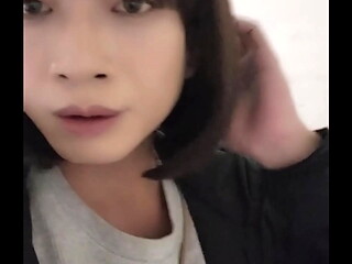 Shemale Ting Xuan outdoors peeing and takes off her underwear for masturbates in the park.
