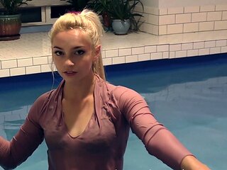 Blonde teen in solo action with her pussy