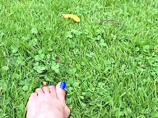 Melove Blue Nail Polish Showing her sexy feet on Grass