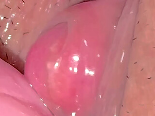 A virgin'_s cute pink clitoris.