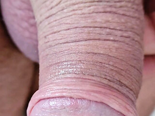 Horny uncut guy playing with long foreskin precum and cumshot