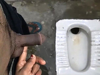 Desi Bhabhi Holding Stepbrother-in-law's Penis and Making Him Pee and Peeing Herself