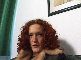 Cute redhead fingering her love hole