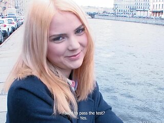 A long-haired blonde, Lolly Small, enjoys riding a big cock in the bedroom