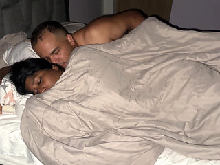 Stepdad wakes up in his stepdaughter's bed and fucks her filling her pussy with cum.