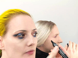 Sissy Bailey Wilde and Woman Putting On Makeup