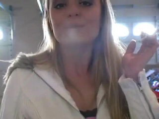 Slutty teens smoking a cigarettes in close up video