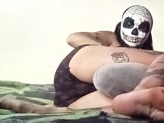 Petite Young Girl Playing Alone with a Pillow