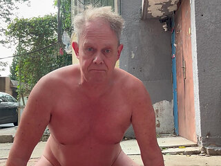 Naked dog pee in public