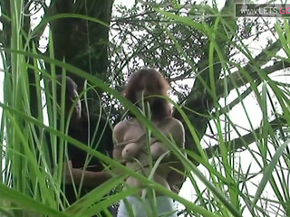 Hot girl gets bound in the bushes for a hard fuck later