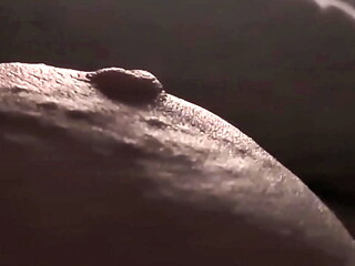 close up pinching my left nipple