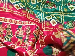 Cum shot on green bandhani silk crepe saree