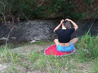 Encounter with a stranger at a waterfall ends in public sex.