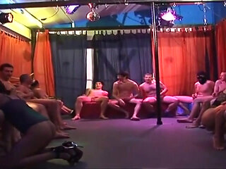 Mature Brunette Devours Multiple Throbbing Cocks in Sloppy Gangbang