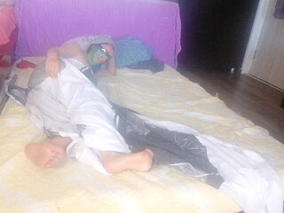 Sensual massage of a hot couple with oil on the body.