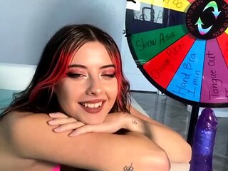 Busty curly brunette with big boobs fucks on couch