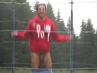 Teen Shows His Big Cock for Fun on a Trampoline at the Camp