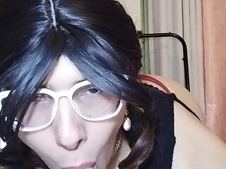 Trans with toy and cage in a chastity