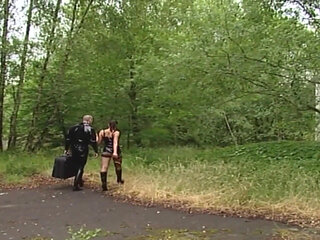 Wild BDSM Slave Licks Bowl in Leather and Fishnets