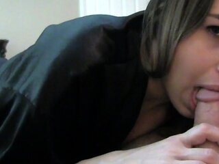 Big tit brunette sucks a big cock POV