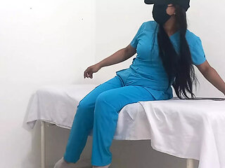 My nurse massages her pussy and moans with pleasure in her office