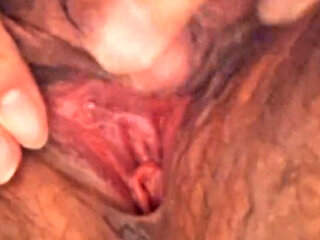 Rubbing big wet clit and squirting