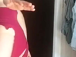 Sexy Latina Having Fun Trying on Clothes and Cutting Them