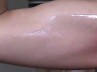 Naked Sportswoman Oils Herself up