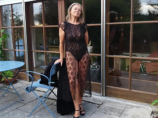 A Mature Woman Shows off Her Figure Outside in a Lace Bodysuit!