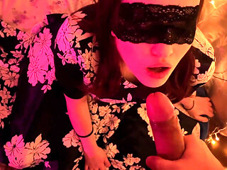 Holiday New Year blowjob from a beautiful woman in a mask and dress