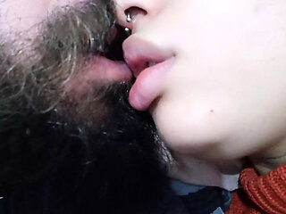 CLOSE UP naughty tongue of the bitch dancing in a hot and naughty kiss