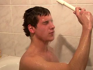 Under the shower I jerk off a hot cock until it cums an...