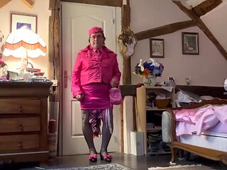 Dressed in a fuchsia miniskirt for her flight attendant party
