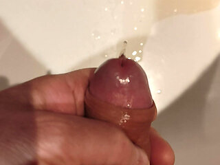 peeing with semi-stiff cock