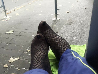 My feet in fishnet stockings