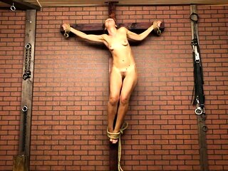Crucified cunt gets lingering agony she deserves