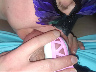 Playing with hubby in his pretty pink ribbon chastity.