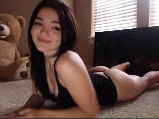 Brunette amateur webcam babe pleases pussy