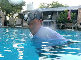 Couple Underwater Diving and Swimming