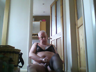 Ian strips ti stockings and bra and uses his hole for fun